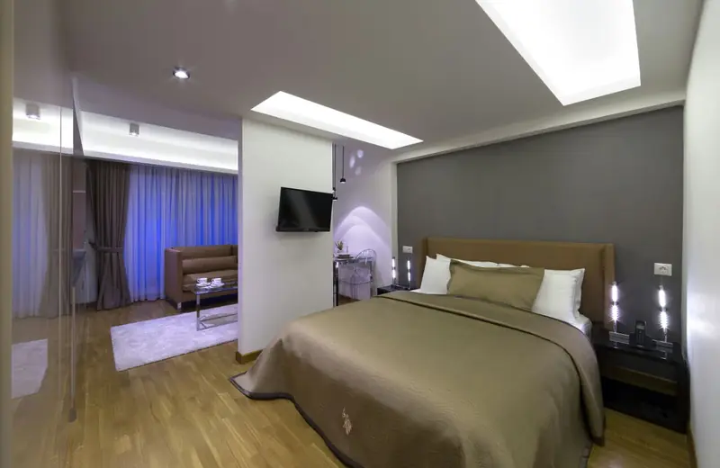 Studio Suite: çift kişilik yatak ve oturma alanı